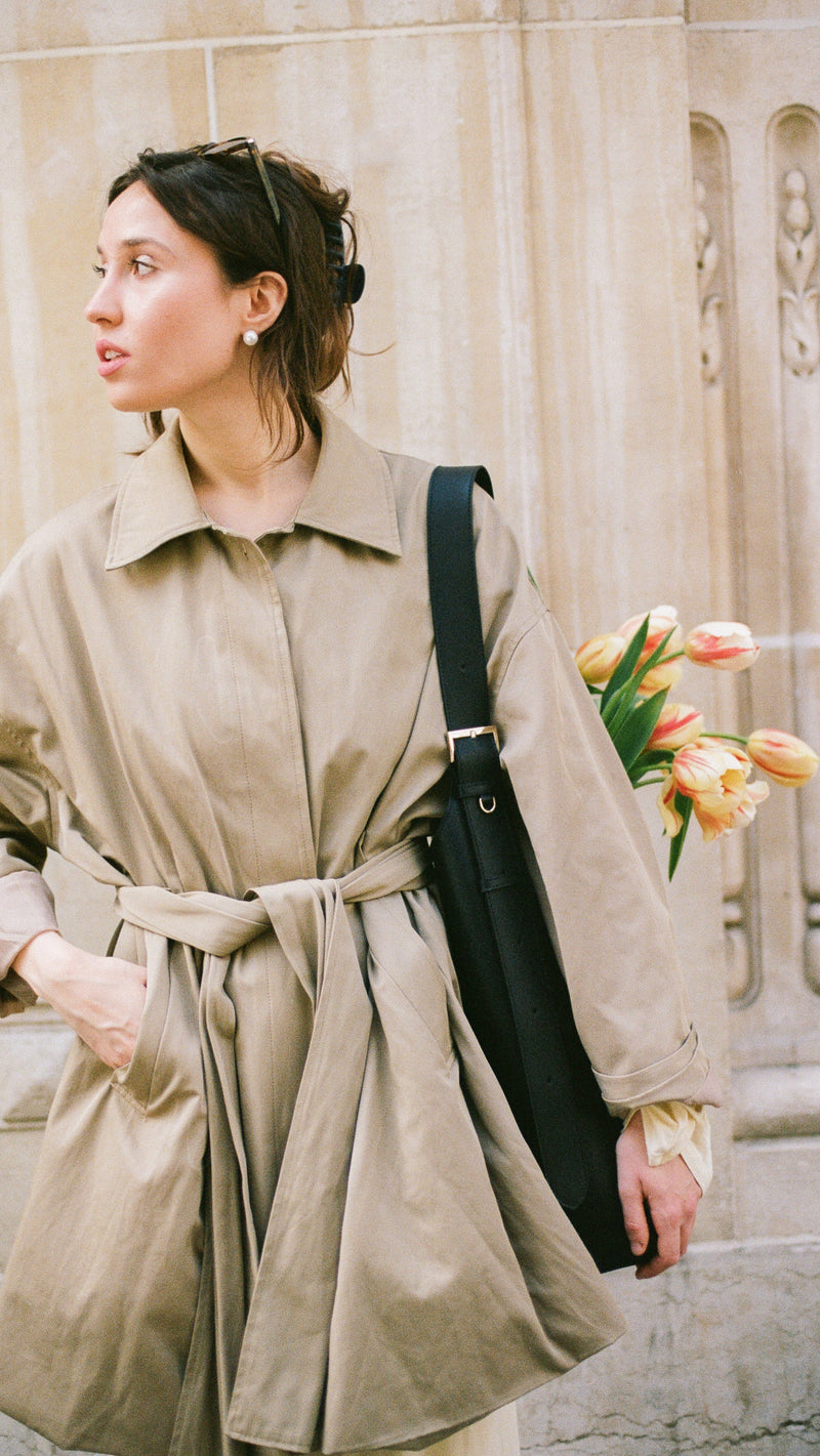 Ava premium leather pouch in sweet cherry by Esnner, minimalist clutch with wrist strap for evening or daily use.