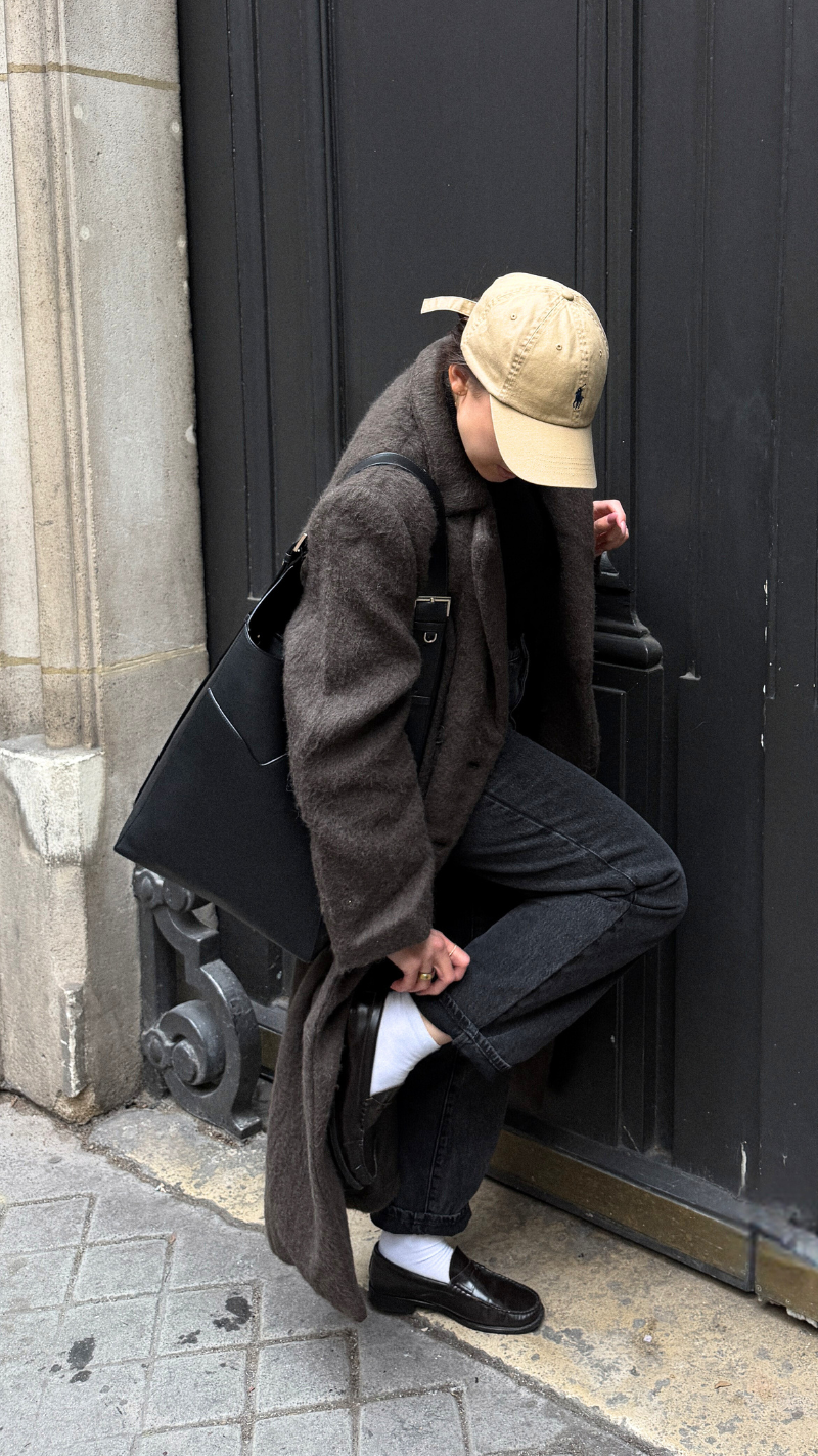 Mila Brown Clay Hobo Bag worn on shoulder with wide leather comfort strap